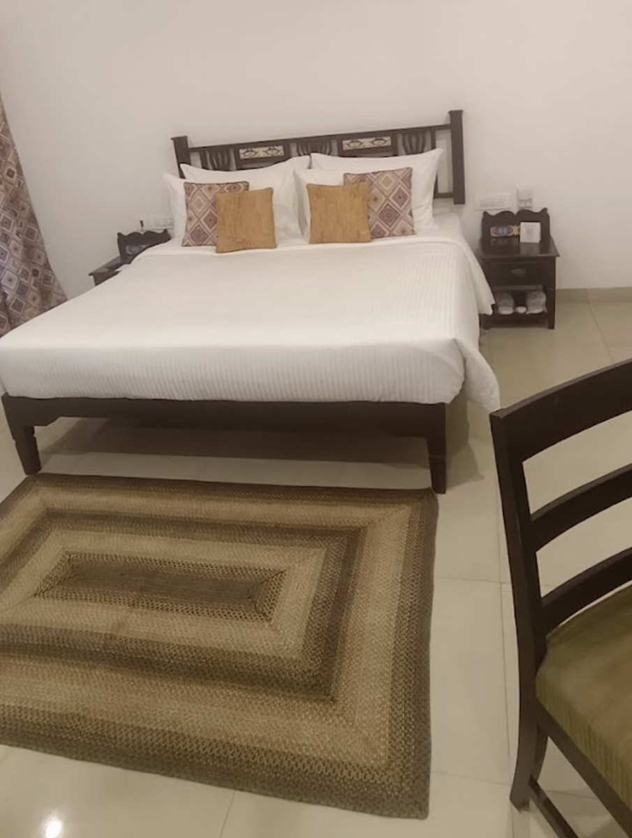 Rustic Bedroom With Patterned Curtains