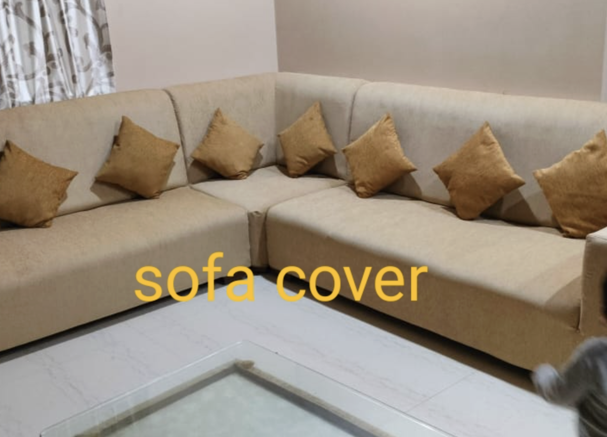 Large Beige Upholstered L-Shaped Sofa